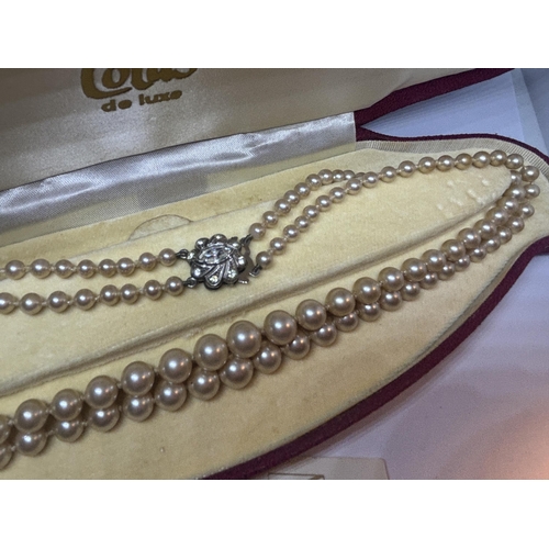 672 - A SET OF LOTUS DOUBLE STRAND PEARLS WITH SILVER CLASP IN ORIGINAL PRESENTATION BOX