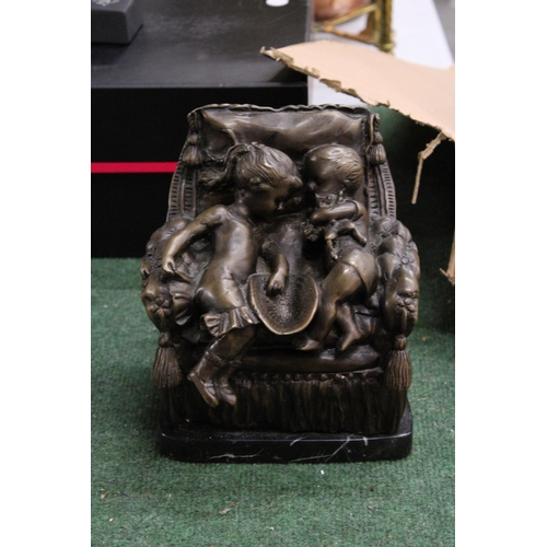 811 - A BRONZE STUDY OF A BOY AND GIRL SITTING ON A CHAIR, ON A MARBLE BASE, HEIGHT 21CM, WIDTH 18CM