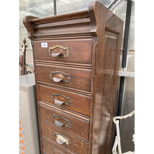 1503 - A VINTAGE TEN DRAWER OAK FILING CHEST WITH SCOOP HANDLES