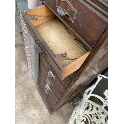 1503 - A VINTAGE TEN DRAWER OAK FILING CHEST WITH SCOOP HANDLES