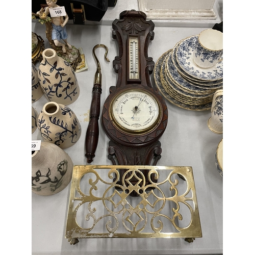 167 - A HANDCARVED WOODEN BANJO BAROMETER, BRASS TEAPOT TRIVET, ETC.,