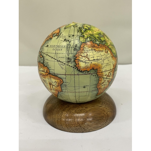 205 - A SMALL WORLD GLOBE ON A WOODEN BASE, HEIGHT 12CM