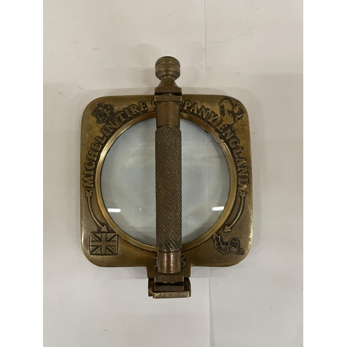 208 - A BRASS MICHELIN MAN MAGNIFYING GLASS IN A LEATHER CASE