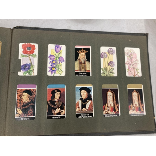 253 - A VINTAGE CIGARETTE CARD ALBUM WITH CARDS