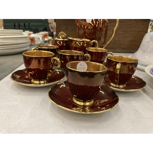 254 - A VINTAGE CARLTON WARE BURGUNDY AND GILT COFFEE SET TO INCLUDE A COFFEE POT, SUGAR BOWL, CREAM JUG, ... 