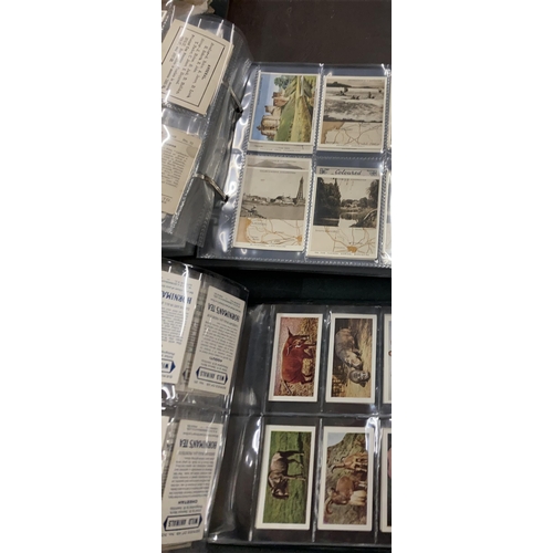 259 - TWO ALBUMS CONTAINING CIGARETTE AND TEA CARDS