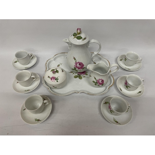 34 - A 19TH CENTURY MEISSEN 'PINK ROSE' TEASET TO INCLUDE A TEAPOT WITH ROSE FINIAL, A TRAY, LIDDED SUGAR... 