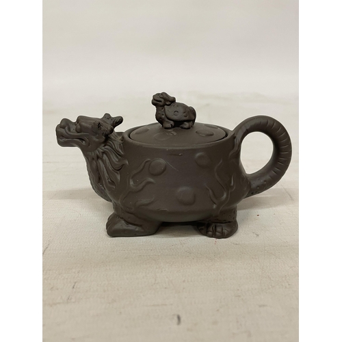 359 - A CHINESE YIXING DRAGON AND TURTLE CLAY TEAPOT