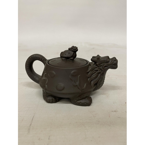 359 - A CHINESE YIXING DRAGON AND TURTLE CLAY TEAPOT