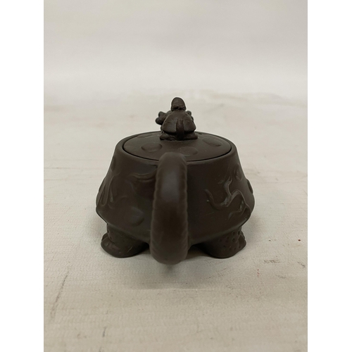 359 - A CHINESE YIXING DRAGON AND TURTLE CLAY TEAPOT