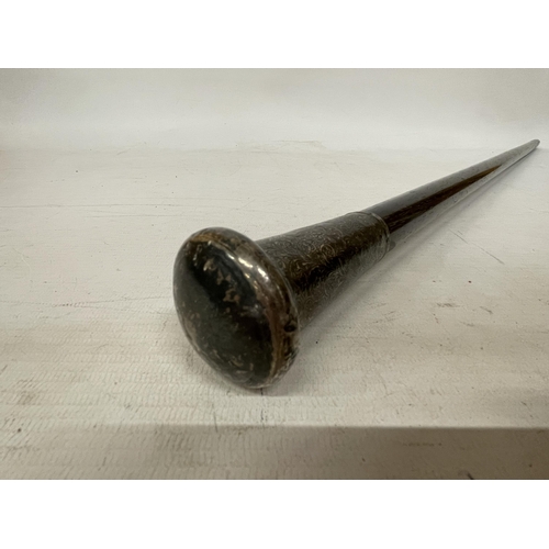 36 - A VINTAGE WALKING CANE WITH A WHITE METAL TOP