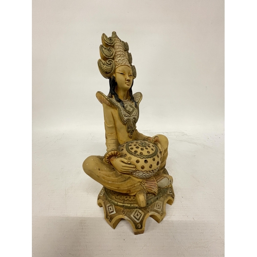 363 - A VINTAGE CARVED RESIN EASTER MOTHER GODDESS SITTING FIGURE