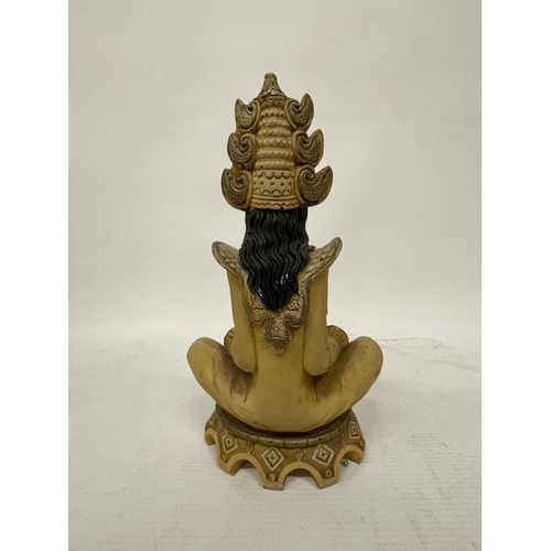 363 - A VINTAGE CARVED RESIN EASTER MOTHER GODDESS SITTING FIGURE