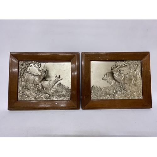 47 - TWO SILVER PLATED FRAMED DEER IN 3D RELIEF, SIGNED TO THE REAR