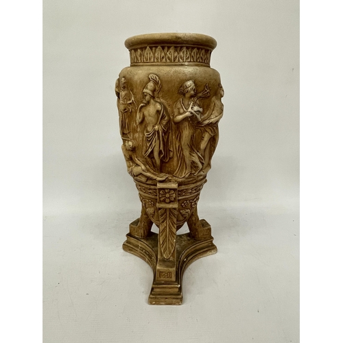 63 - A LARGE STONEWARE VASE WITH RELIEF CLASSICAL DECORATION ON A TRIPOD STYLE BASE, HEIGHT 43CM