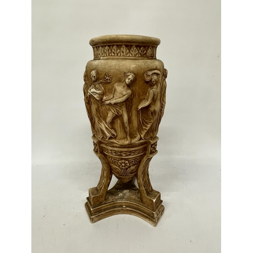 63 - A LARGE STONEWARE VASE WITH RELIEF CLASSICAL DECORATION ON A TRIPOD STYLE BASE, HEIGHT 43CM