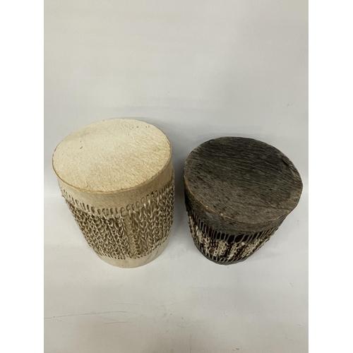 64 - TWO AFRICAN TRIBAL HIDE BONGO DRUMS