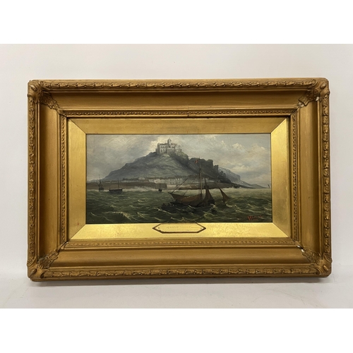 69 - AN OIL ON BOARD OF ST MICHAEL'S MOUNT SIGNED R H EARWICKER 1894 IN AN ORNATE GILT FRAME