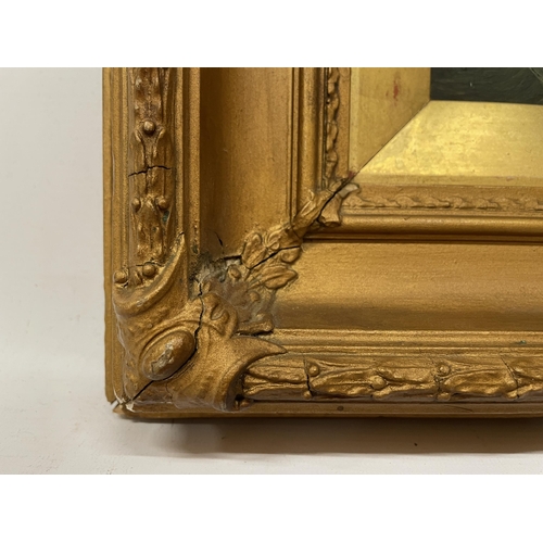 69 - AN OIL ON BOARD OF ST MICHAEL'S MOUNT SIGNED R H EARWICKER 1894 IN AN ORNATE GILT FRAME