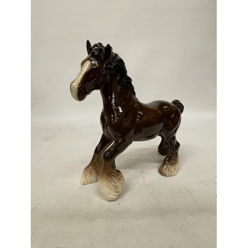 737 - A ROYAL DOULTON FIGURE OF A CANTERING SHIRE HORSE