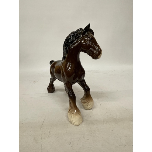 737 - A ROYAL DOULTON FIGURE OF A CANTERING SHIRE HORSE