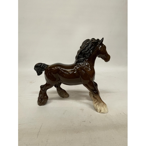 737 - A ROYAL DOULTON FIGURE OF A CANTERING SHIRE HORSE