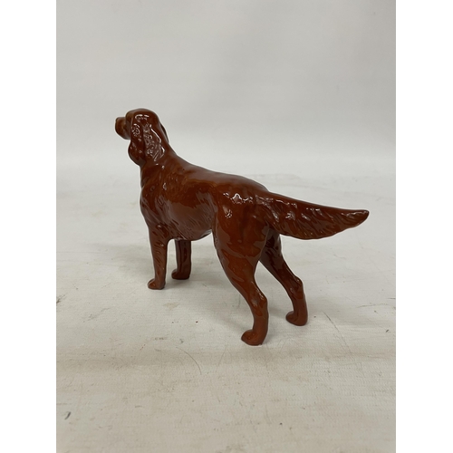 741 - A VINTAGE BESWICK GLAZED FIGURE OF AN IRISH SETTER