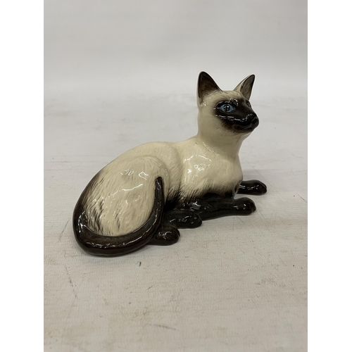 742 - A BESWICK GLAZED FIGURE OF A SIAMESE CAT