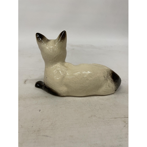 742 - A BESWICK GLAZED FIGURE OF A SIAMESE CAT