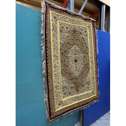 99 - A HEAVILY EMBROIDERED AND BEADED SATIN BACKED WALL HANGING, EMBELLISHED WITH SEMI PRECIOUS STONES 95... 