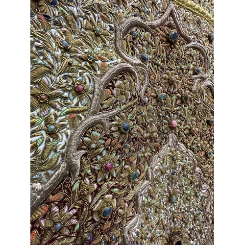 99 - A HEAVILY EMBROIDERED AND BEADED SATIN BACKED WALL HANGING, EMBELLISHED WITH SEMI PRECIOUS STONES 95... 