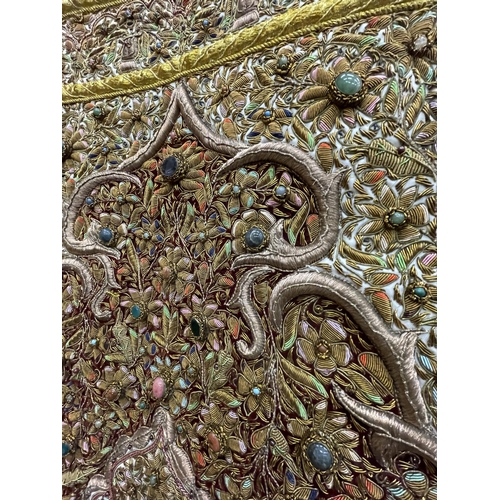 99 - A HEAVILY EMBROIDERED AND BEADED SATIN BACKED WALL HANGING, EMBELLISHED WITH SEMI PRECIOUS STONES 95... 