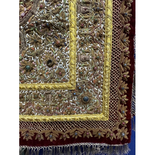 99 - A HEAVILY EMBROIDERED AND BEADED SATIN BACKED WALL HANGING, EMBELLISHED WITH SEMI PRECIOUS STONES 95... 