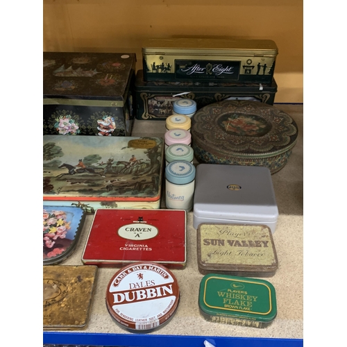 402 - A LARGE COLLECTION OF VINTAGE TINS AND CONTAINERS