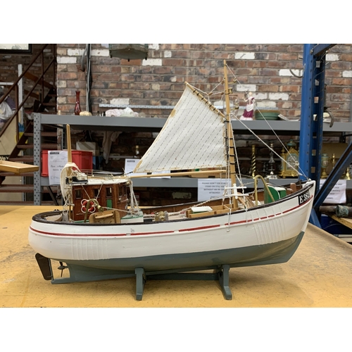 410 - A WOODEN MODEL OF A FISHING BOAT