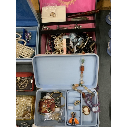 438 - A LARGE COLLECTION OF COSTUME JEWELLERY AND JEWELLERY BOXES