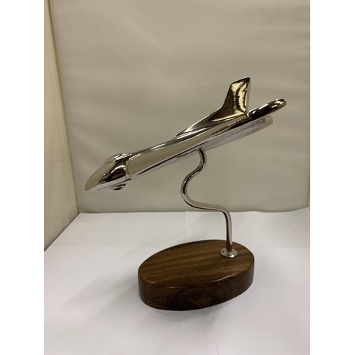 449 - A CHROME VULCAN BOMBER ON A WOODEN BASE, HEIGHT 19CM