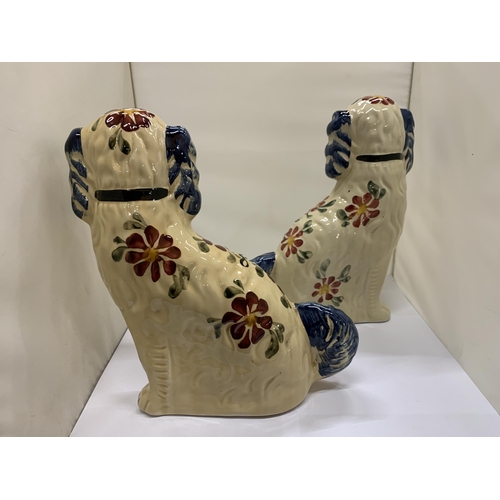 462 - A PAIR OF FLORAL STAFFORDSHIRE DOGS