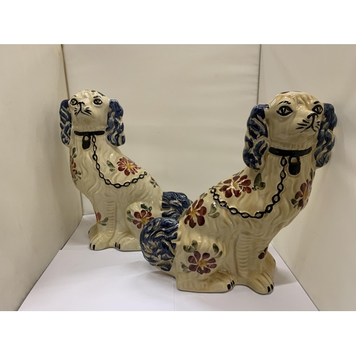 462 - A PAIR OF FLORAL STAFFORDSHIRE DOGS