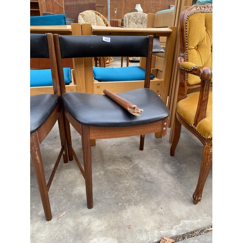 3034 - A PAIR OF RETRO TEAK AND BLACK FAUX LEATHER DINING CHAIRS (ONE A/F)