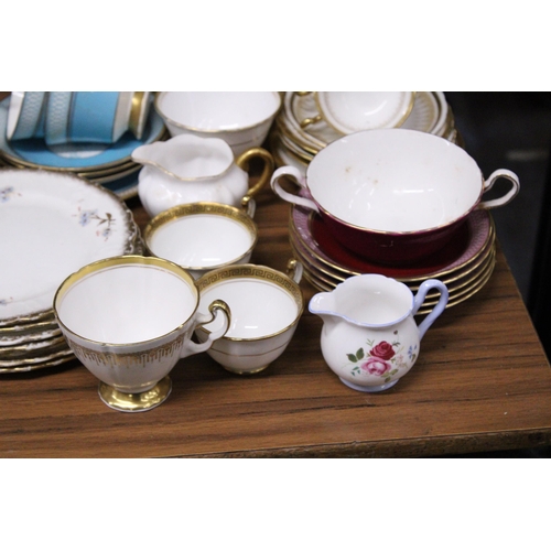 1017 - A LARGE QUANTITY OF TEACUPS, SAUCERS, SIDE PLATES AND MILK JUGS TO INCLUDE MAYFAIR CHINA, SHELLEY, R... 