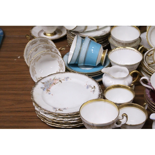 1017 - A LARGE QUANTITY OF TEACUPS, SAUCERS, SIDE PLATES AND MILK JUGS TO INCLUDE MAYFAIR CHINA, SHELLEY, R... 