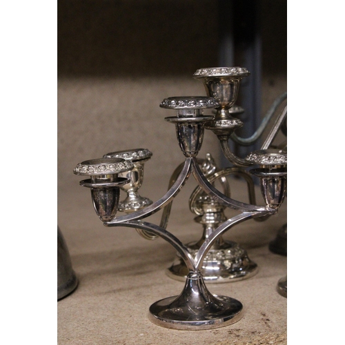 1026 - A COLLECTION OF SILVERPLATE CANDLEABRA'S