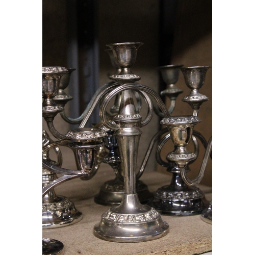 1026 - A COLLECTION OF SILVERPLATE CANDLEABRA'S