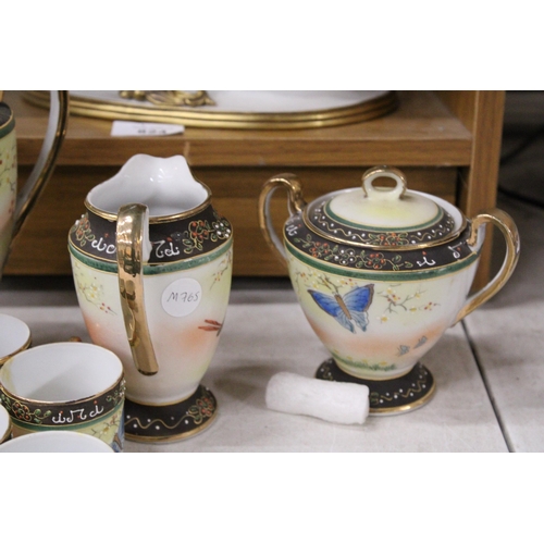 369 - A JAPANESE HAND PAINTED PORCELAIN 15 PIECE COFFEE SET WITH BUTTERFLY AND DRAGONFLY MOTIF