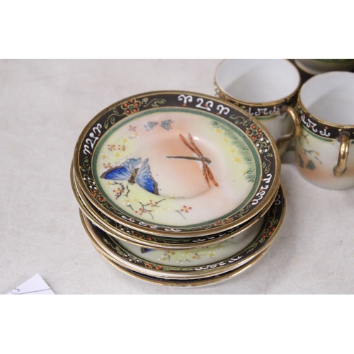 369 - A JAPANESE HAND PAINTED PORCELAIN 15 PIECE COFFEE SET WITH BUTTERFLY AND DRAGONFLY MOTIF