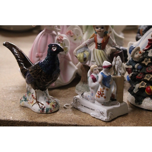 851 - A QUANTITY OF LADY FIGURES, A FAIRING, PHEASANT, ETC