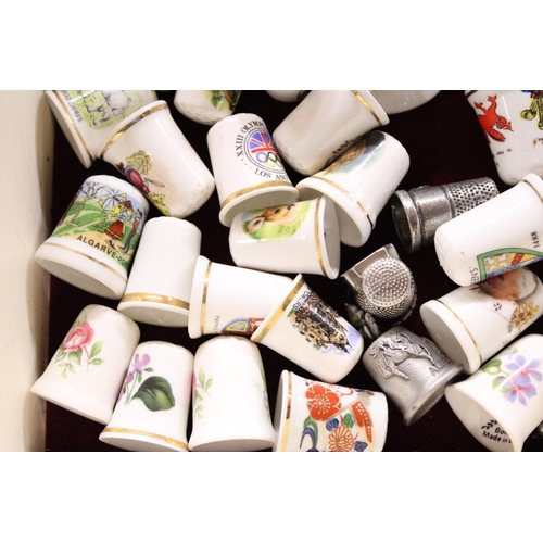 854 - A COLLECTION OF CHINA THIMBLES