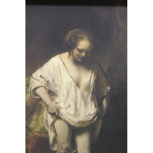 875 - A FRAMED REMBRANDT PRINT - WOMAN BATHING IN A STREAM