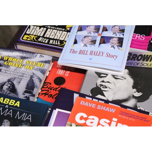 877 - A COLLECTION OF MUSIC BOOKS TO INCLUDE NORTHERN SOUL, BUDDY HOLLY, ABBA, JAMES BROWN JIMI HENDRIX, E... 